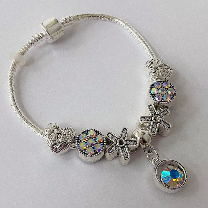 Pulsera Dora con 7 Dijes- Metal Blanco PAR057