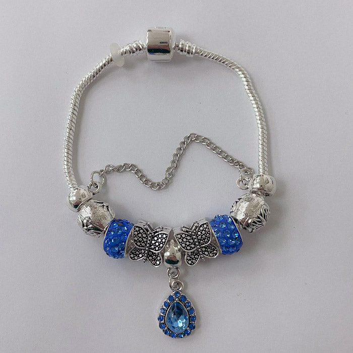 Pulsera Dora con Dijes- Metal Blanco PAR169