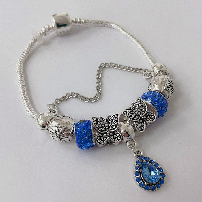 Pulsera Dora con Dijes- Metal Blanco PAR169