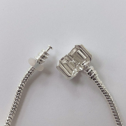 Pulsera Dora con 7 Dijes- Metal Blanco PAR056
