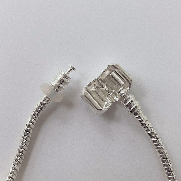 Pulsera Dora con 7 Dijes- Metal Blanco PAR055