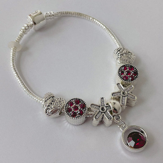 Pulsera Dora con 7 Dijes- Metal Blanco PAR059
