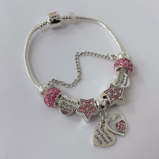 Pulsera Dora con Dijes- Metal Blanco PAR085