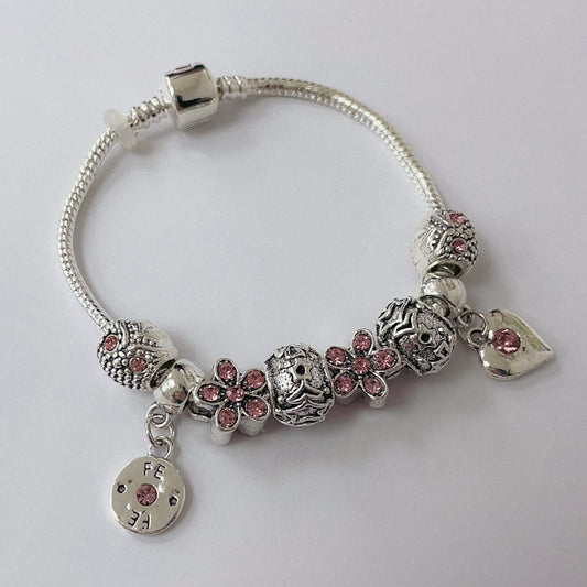 Pulsera Dora con Dijes- Metal Blanco PAR092