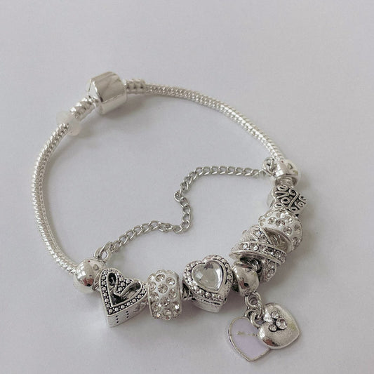 Pulsera Dora con Dijes- Metal Blanco PAR134