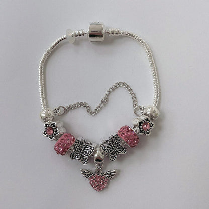 Pulsera Dora con Dijes- Metal Blanco PAR140