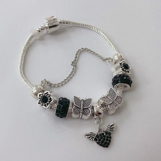 Pulsera Dora con Dijes- Metal Blanco PAR144