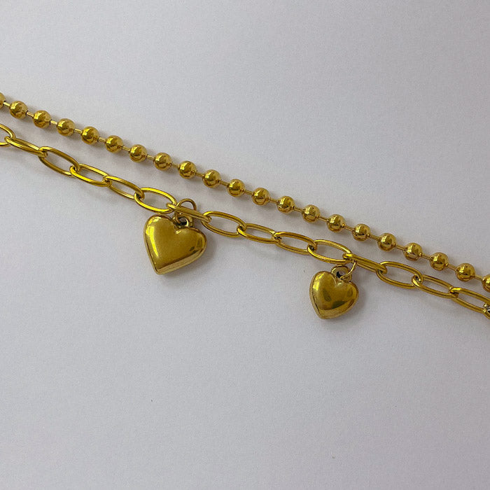 Pulseras Doble de Acero Dorado 316L con dijes de Corazon PAD031