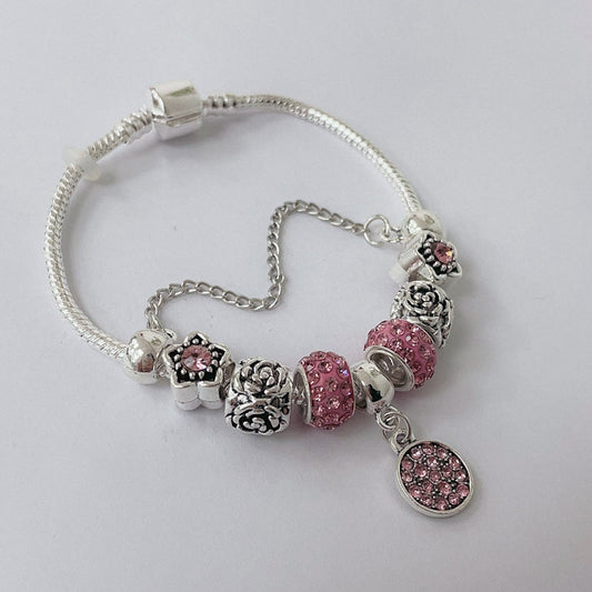 Pulsera Dora con Dijes- Metal Blanco PAR190
