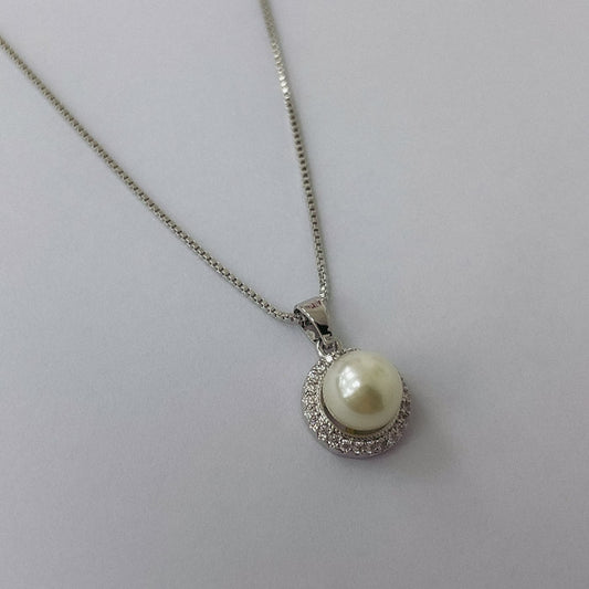 Conjunto Rodinado Medalla Micro Cristal y Perla CRA002