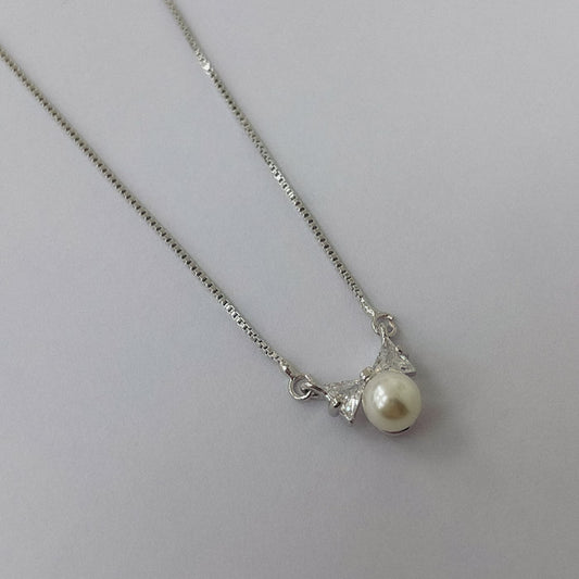 Conjunto Rodinado Moño Micro Cristal y Perla CRA003